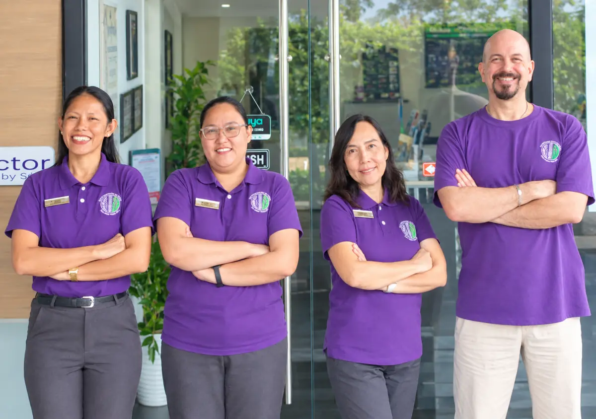 Doc Steve, Amy, and the clinic team at The Chiropractor by SLEX in Biñan